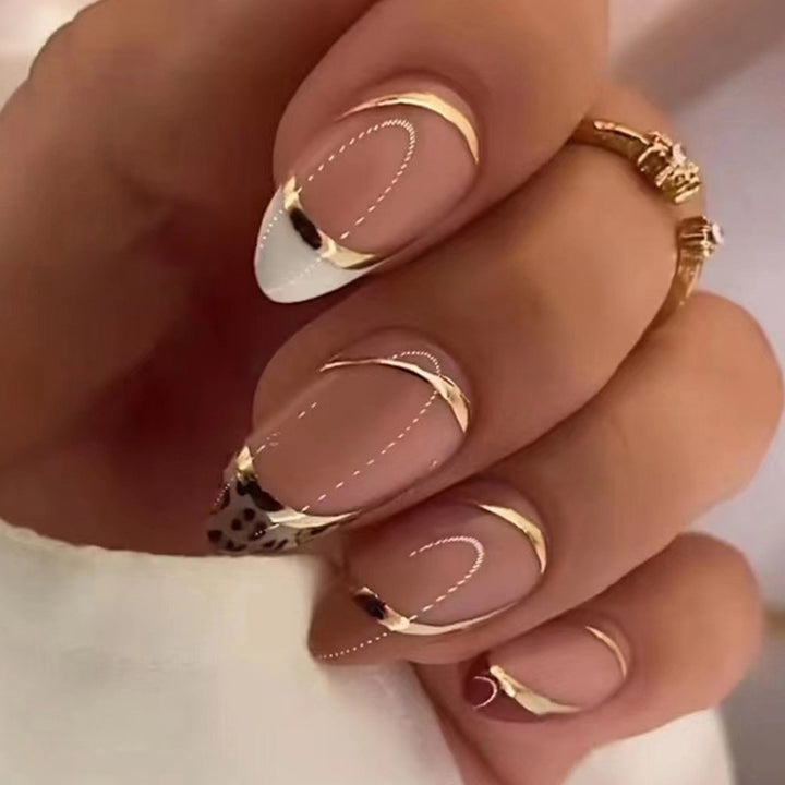 Artful stiletto nails with heart-shaped accents Kalsten