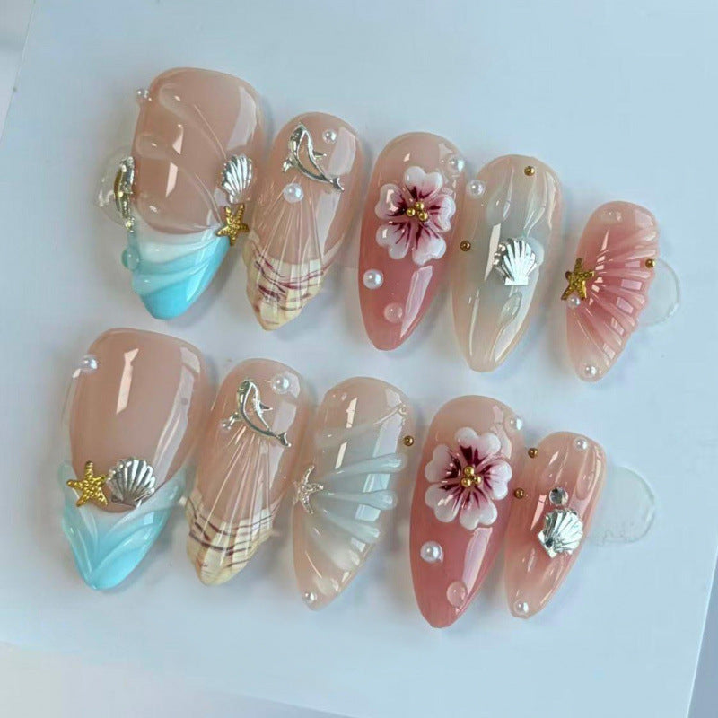 Acrylic nail set with filigree shell and flower decorations Kalsten