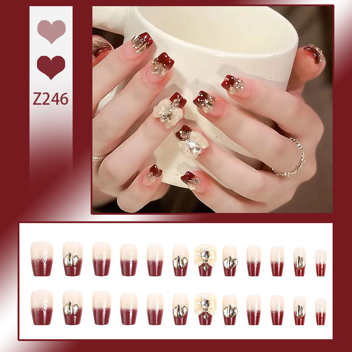 Artificial nails with glamorous floral decorations Kalsten