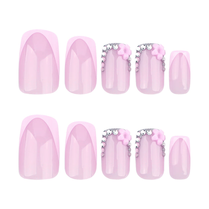 Artful gel nails with elegant floral design and glitter accents Kalsten