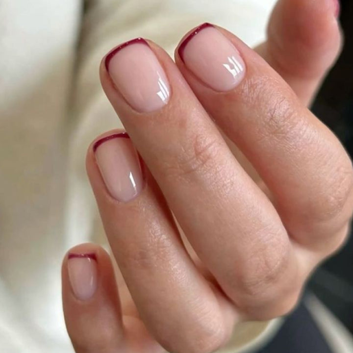 Elegant and stylish nail art with narrow colored accents Kalsten