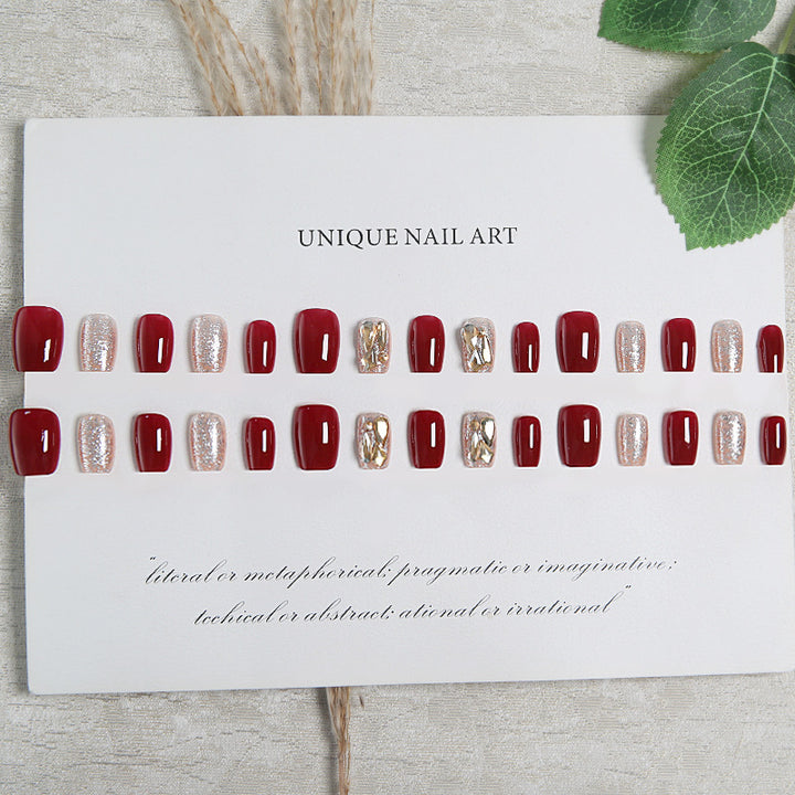 Artificial nail set with elegant glitter and metallic accents Kalsten
