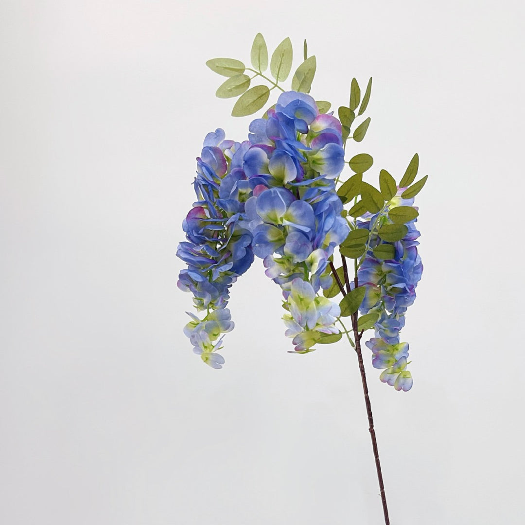 Artificial flower branch with lifelike, hanging flowers