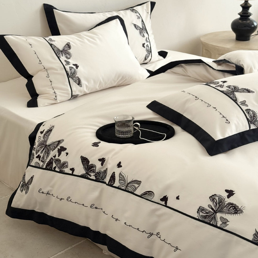 Luxurious cotton satin bedding set with butterfly embroidery and contrasting piping Kalsten