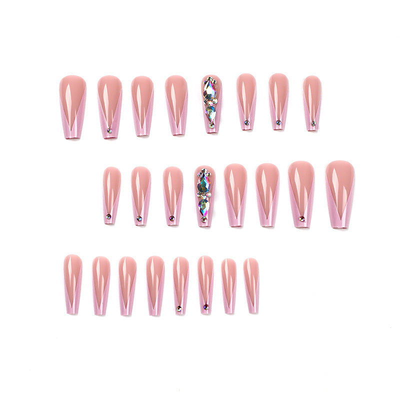 Artful nail extensions with rhinestone and flower accents Kalsten