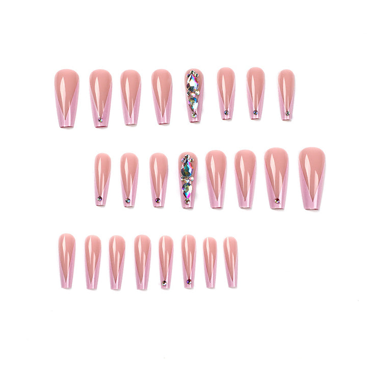 Artful nail extensions with rhinestone and flower accents Kalsten