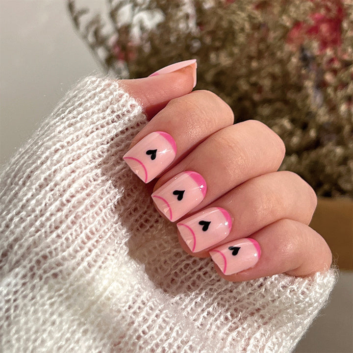 Creative Nail Art with Heart Design and Glitter Accents Kalsten