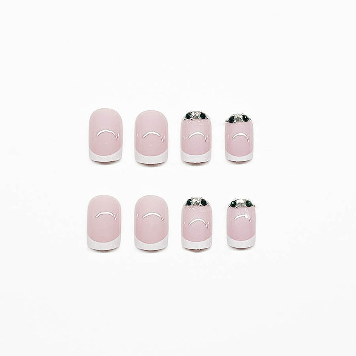 Art nail set with elegant French design and glittering accents Kalsten