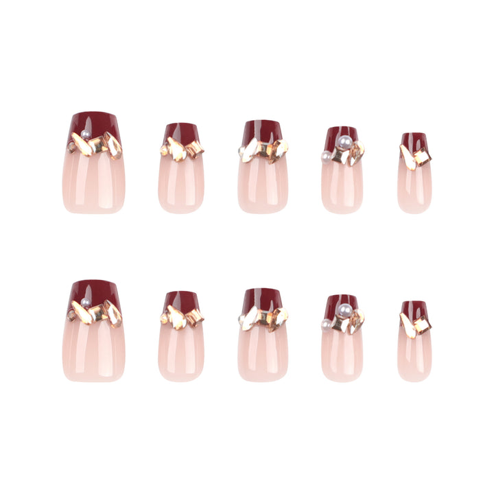 Artful nail extensions with glitter and jewelry embellishments Kalsten