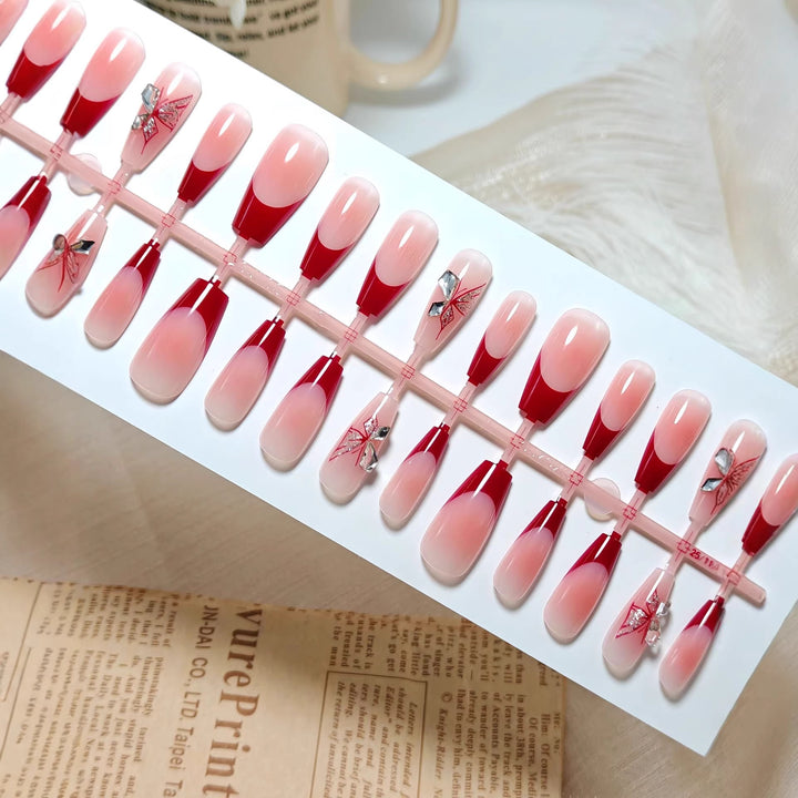 Artificial nails with elegant floral design and glitter accents Kalsten