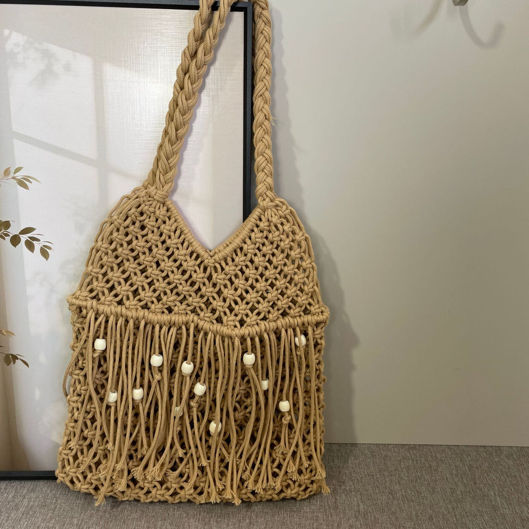 Macramé bag with long fringes and wooden beads Kalsten