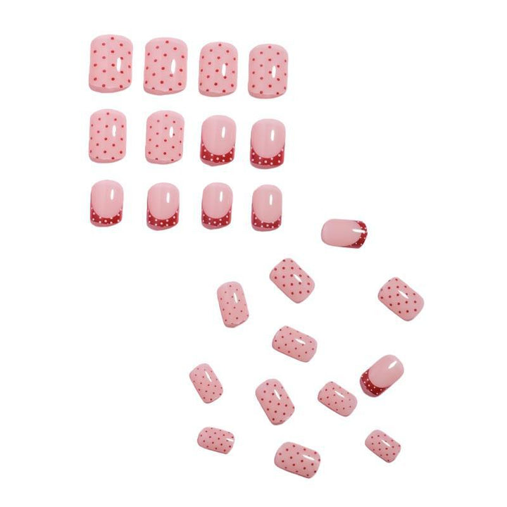 Stylish Press-On Nail Design with Polka Dot and French Tip Accents Kalsten