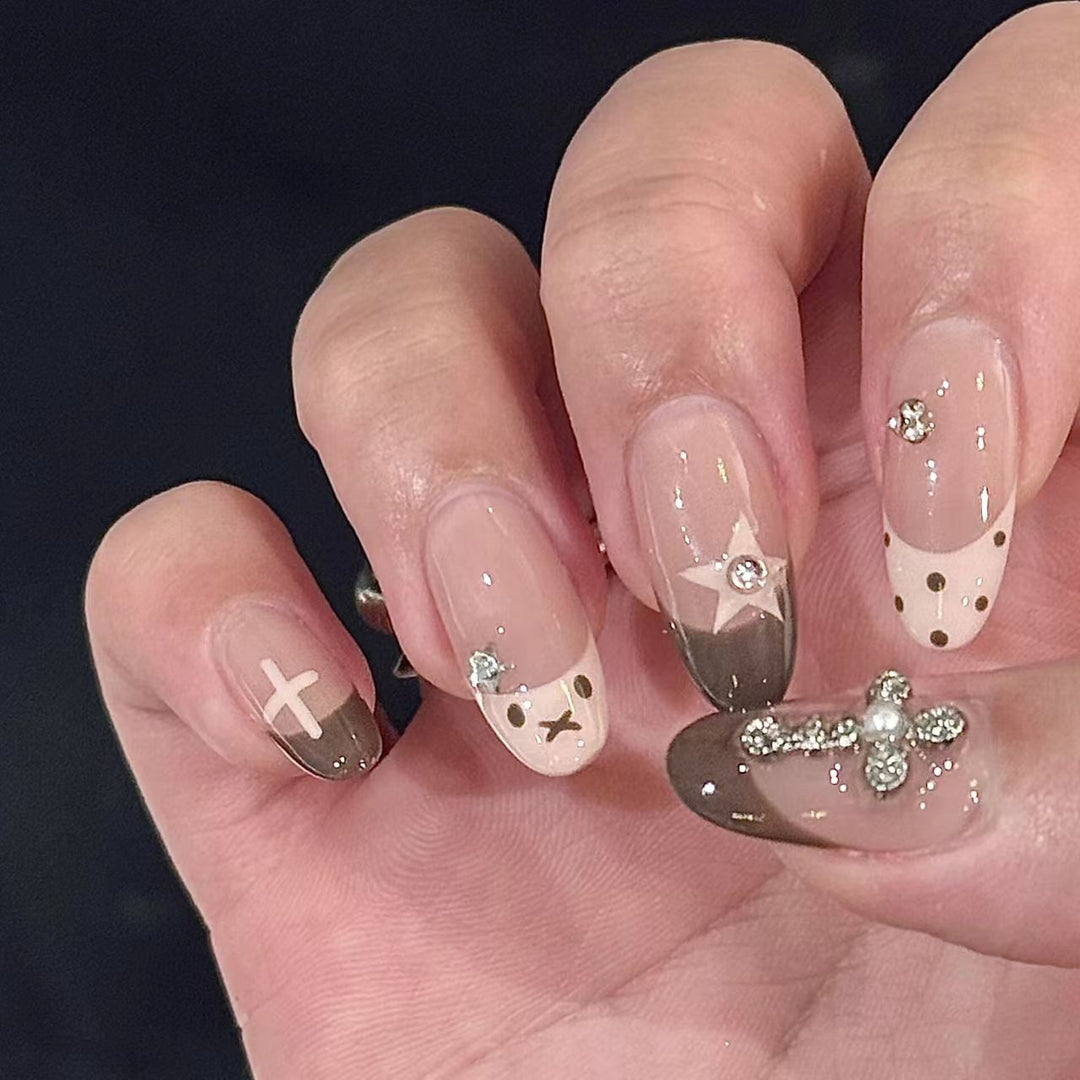 Artificial nails with creative design and sparkling accents Kalsten