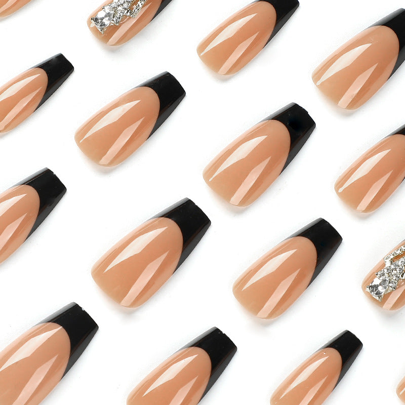 Glamorous artificial nails with rhinestones and black tips Kalsten