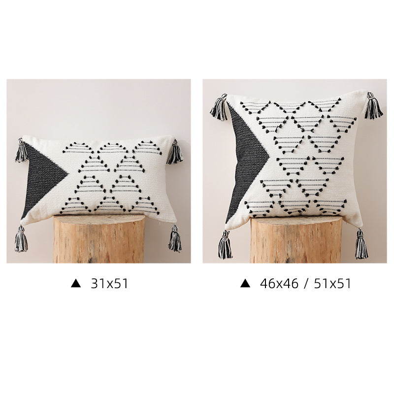 Decorative woven cushion cover with geometric tuft-relief and tassels Kalsten