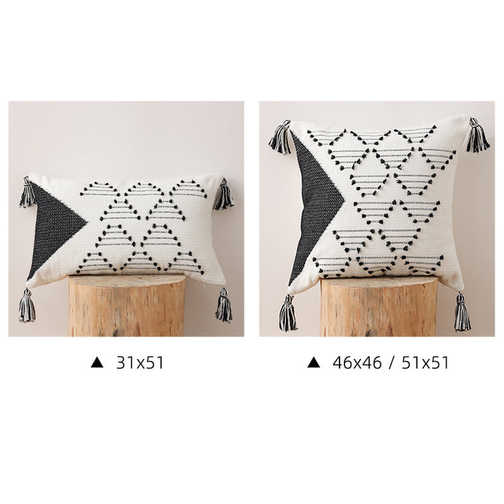 Decorative woven cushion cover with geometric tuft-relief and tassels Kalsten