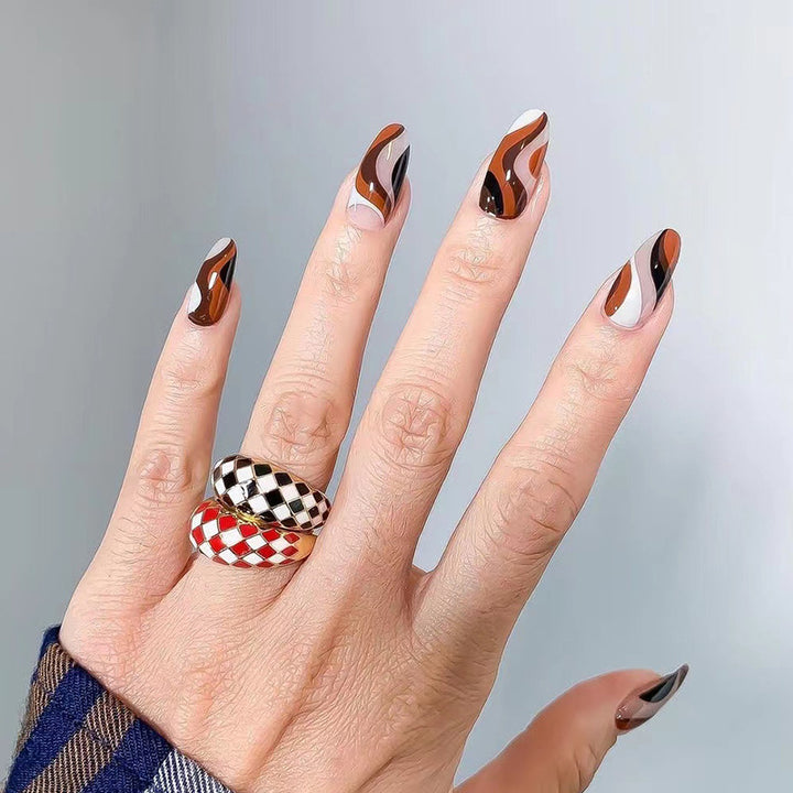 Artfully decorated nail extensions Kalsten