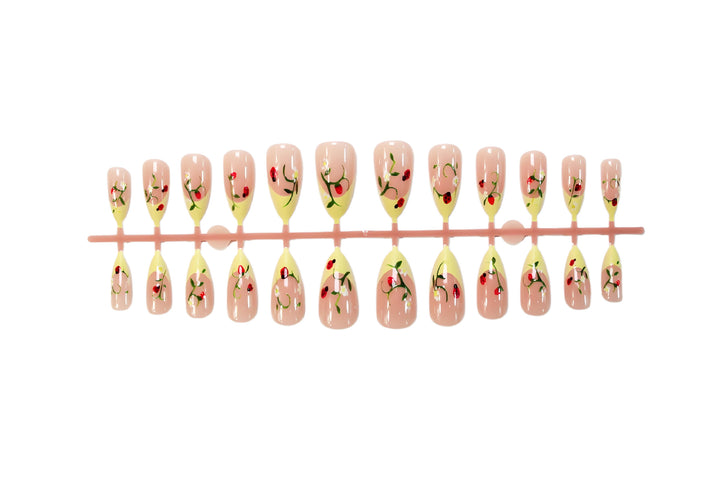 Artificial nail set with elegant gradient and floral accents Kalsten