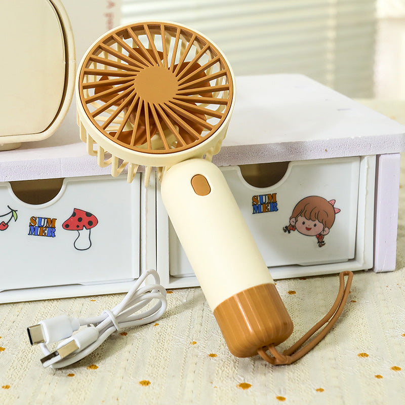 Portable hand fan with ergonomic grip and USB charging function Kalsten