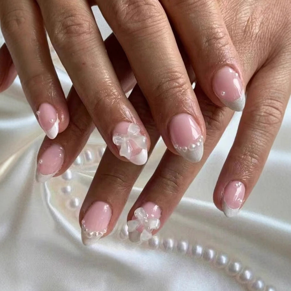 Artificial nail set with exquisite 3D flowers and elegant pearl embellishments Kalsten