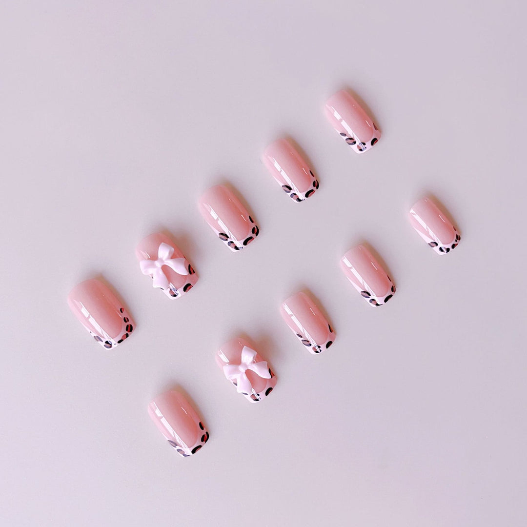Artificial nail set with elegant leopard design and cute bows Kalsten