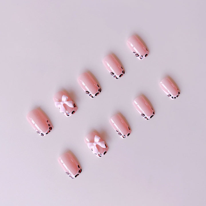 Artificial nail set with elegant leopard design and cute bows Kalsten