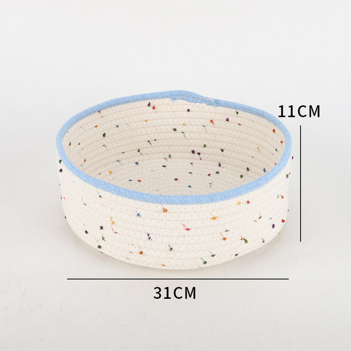 Storage basket made of natural cotton fabric with colorful dots