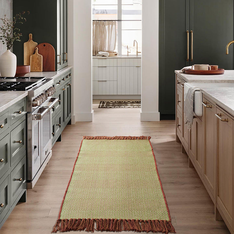 Woven table runner with dense herringbone jacquard and fringes Kalsten