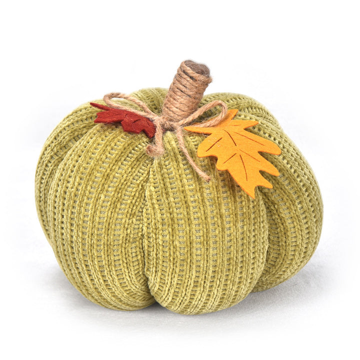 Handcrafted knitted decorative pumpkin as autumn table decoration