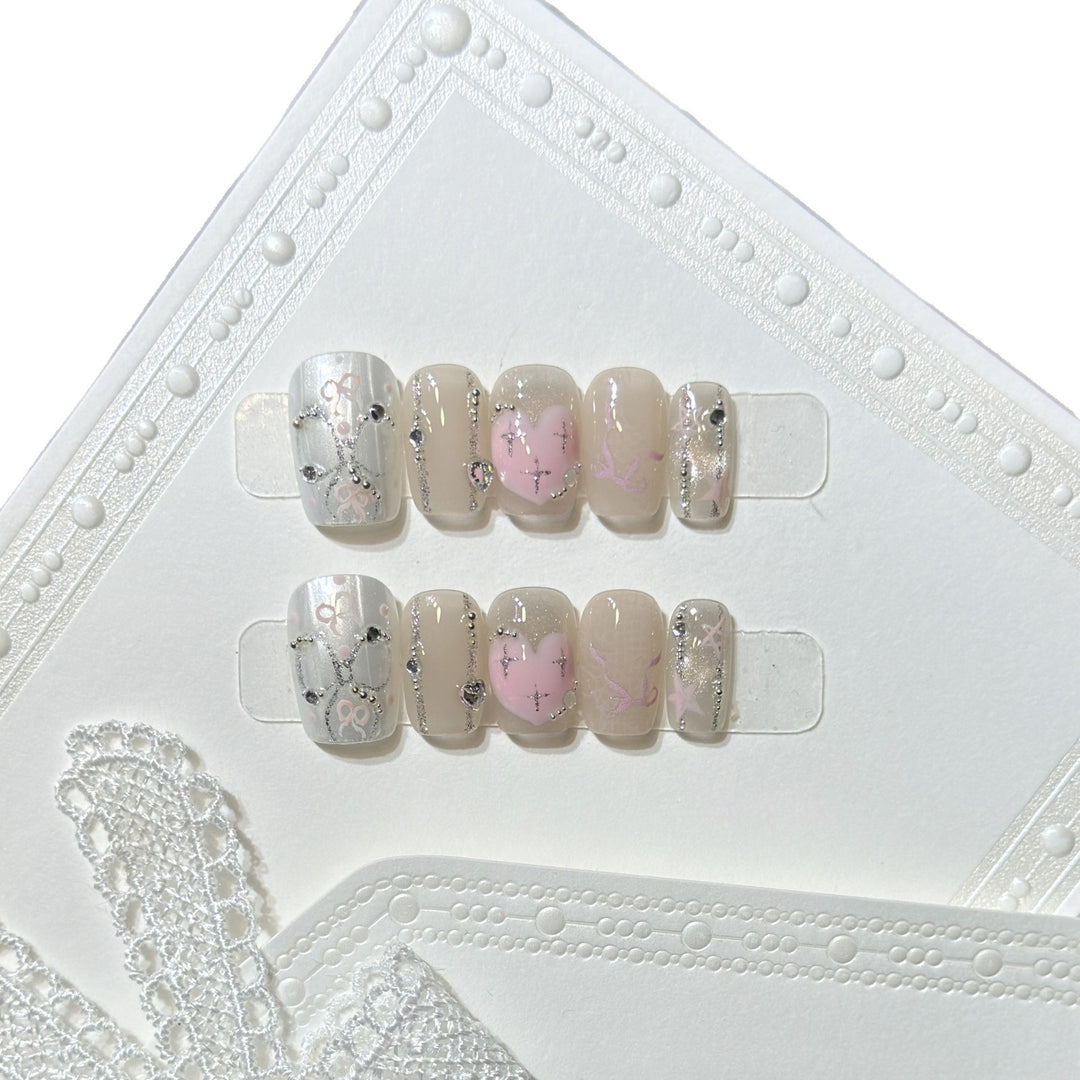 Decorative Press-On Nail Set with Heart and Silver Accents Kalsten