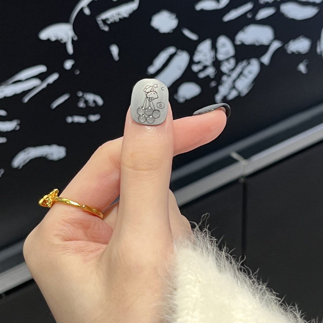 Artistic Press-On Nail Set with Whimsical Character Designs Kalsten