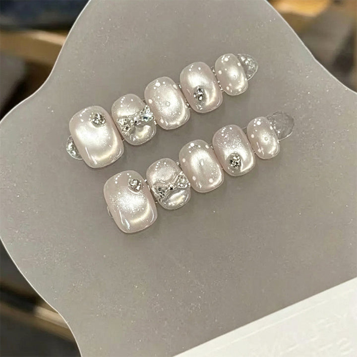Artificial nail set with elegant glitter and crystal decorations Kalsten