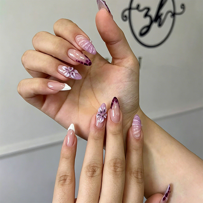 Artificial nail set with elegant ombre design and floral accents Kalsten