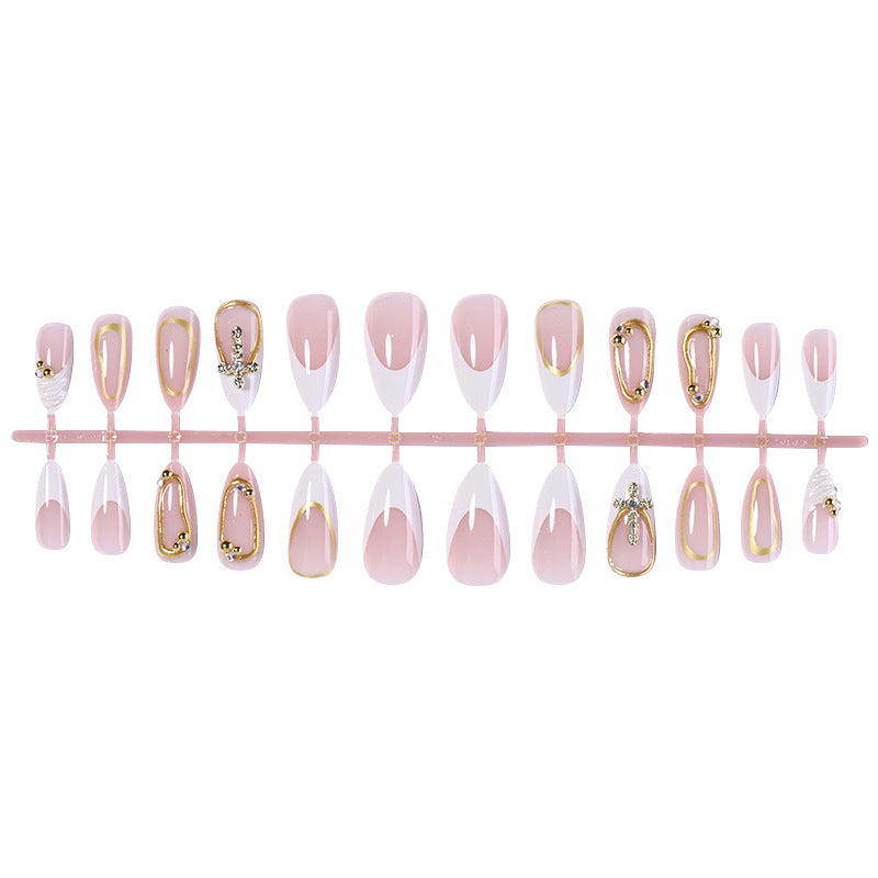Artificial nail set with luxurious gold embellishments and elegant designs Kalsten
