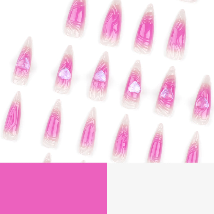 Artistic stiletto nails with heart design and glitter accents Kalsten