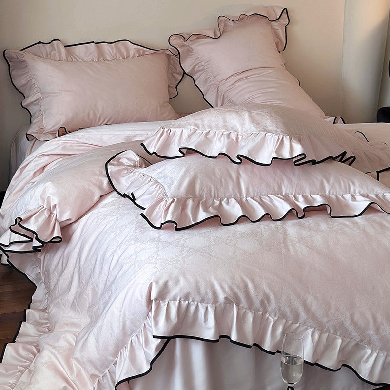 Luxurious cotton satin bedding set with ruffles and contrasting piping