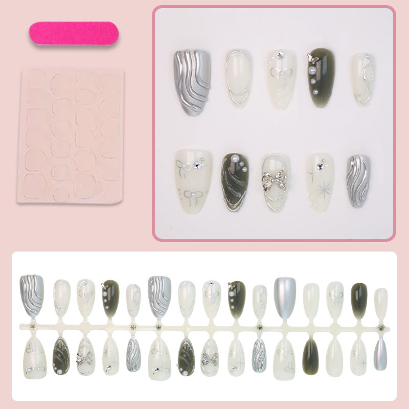 Nail set with luxurious 3D decorations and elegant stone accents Kalsten