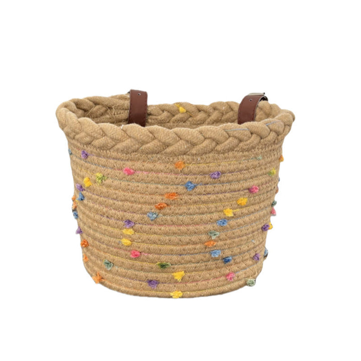 braided rope bike basket with pom pom embellishments and leather handlebar straps Kalsten