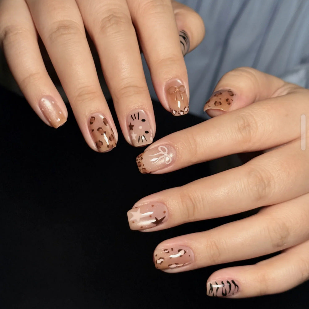 Artistic Press-On Nail Design with Gemstone Accents Kalsten