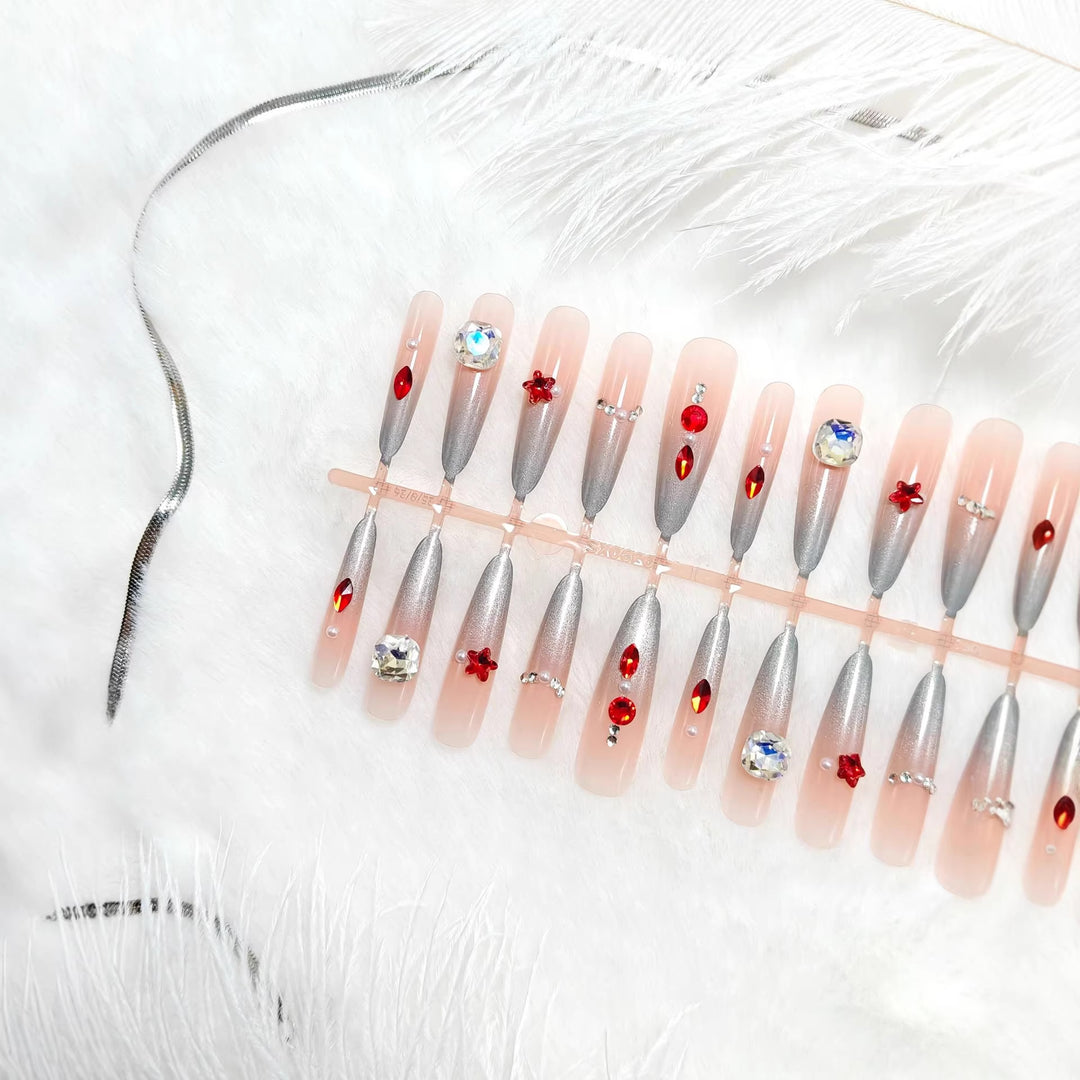 Artificial nails with glamorous design and sparkling accents Kalsten