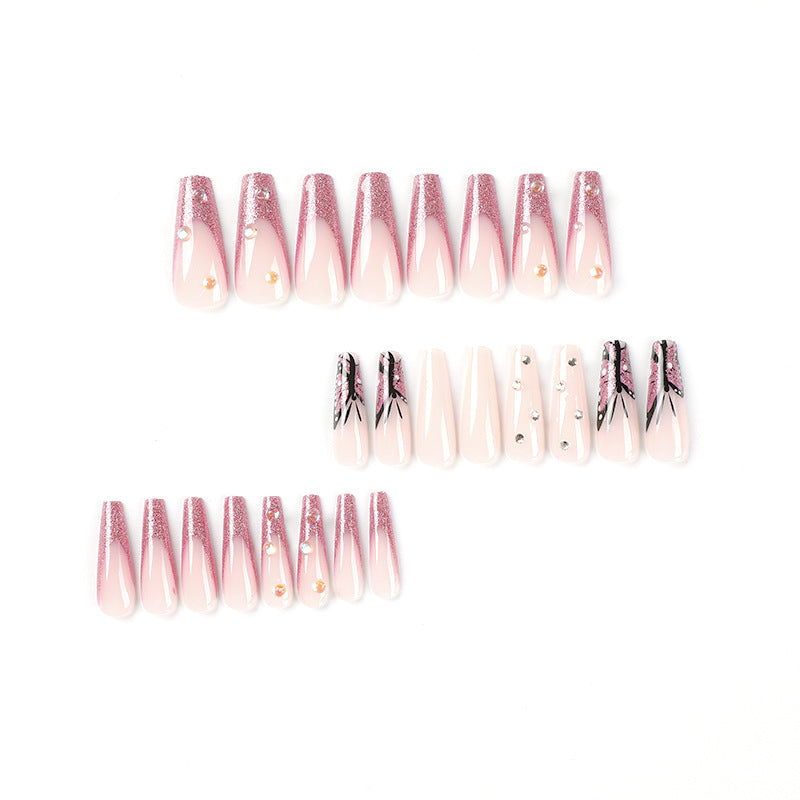 Artful stiletto nails with floral and glittering accents Kalsten