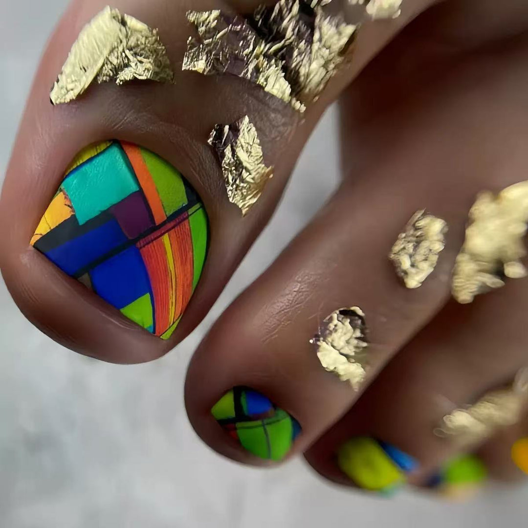 Creative toenail design with modern geometric patterns and golden accents Kalsten