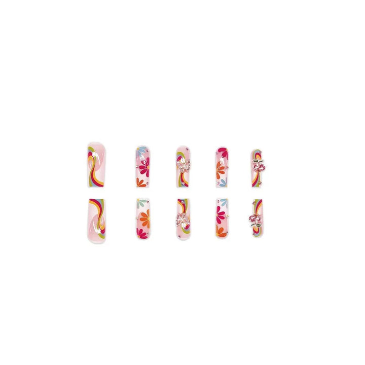 Artificial nails with colorful floral patterns and decorative accents Kalsten