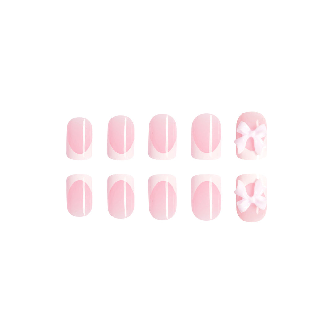 Artificial nails with cute bow designs Kalsten