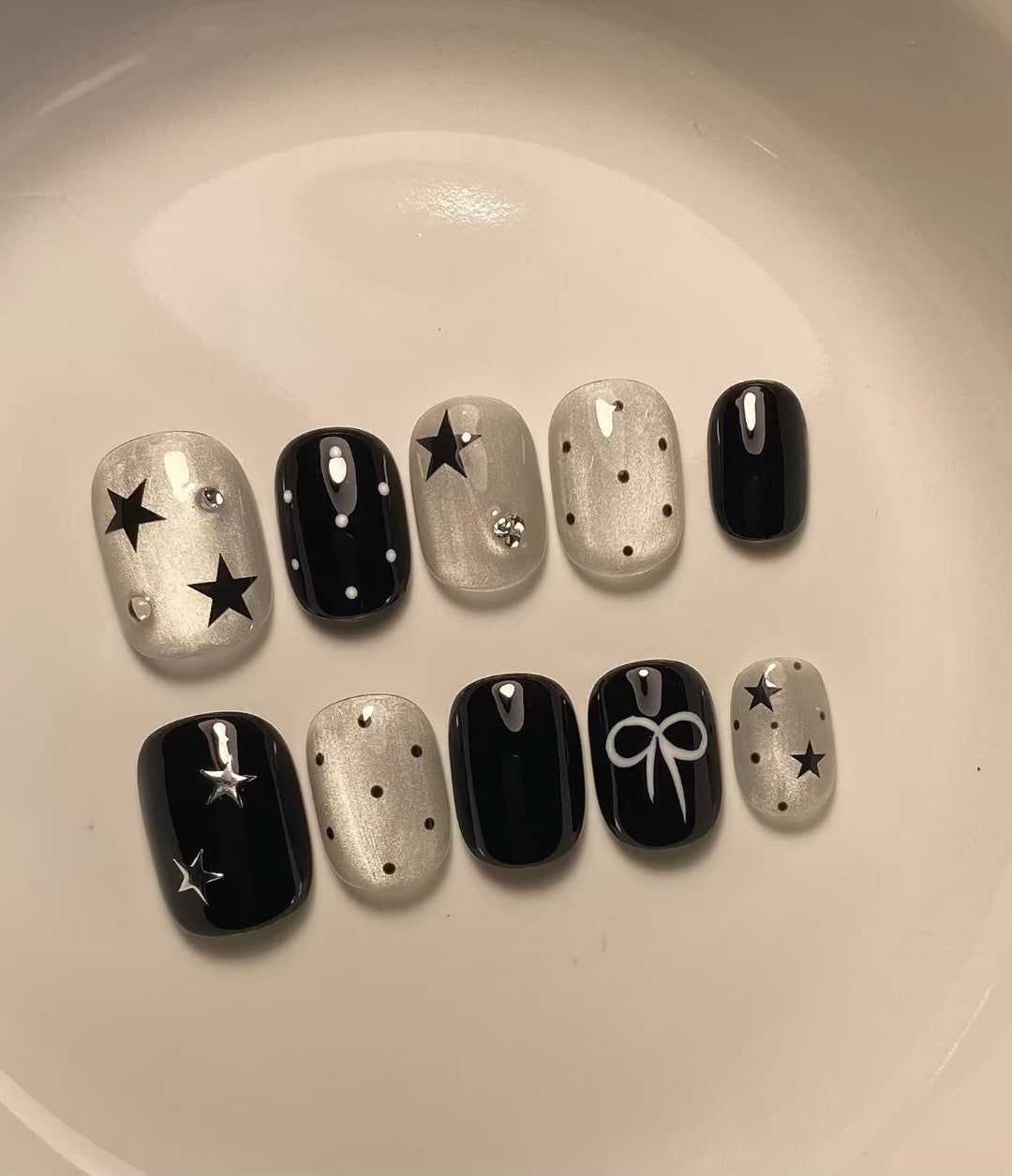 Artistic Press-On Nail Set with Star and Bow Accents