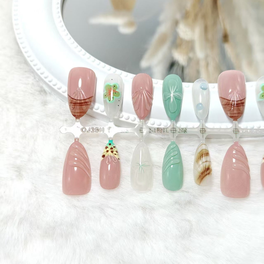 Artificial nail set with exquisite floral designs and shimmering effects Kalsten
