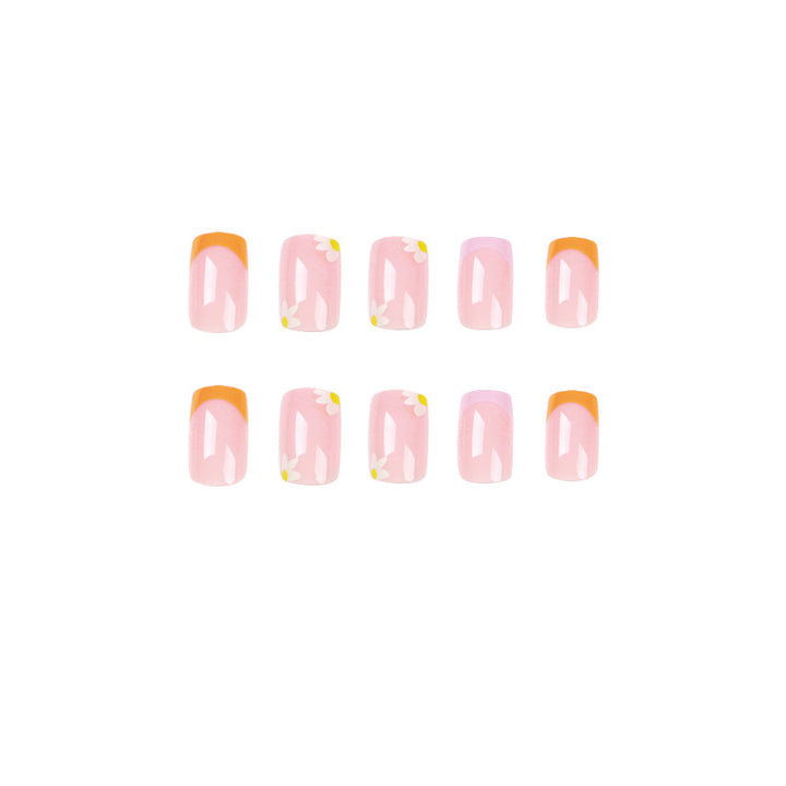 Artistic acrylic nails with floral design and creative color accents Kalsten