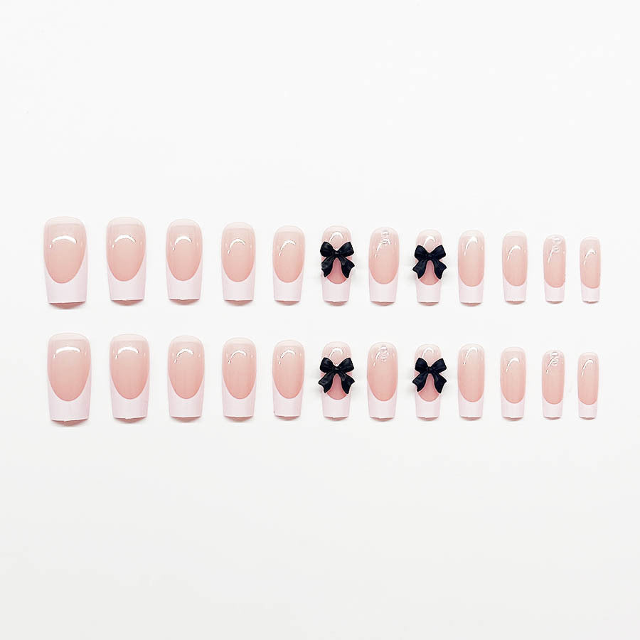 Acrylic nail set with stylish black and pearl details Kalsten