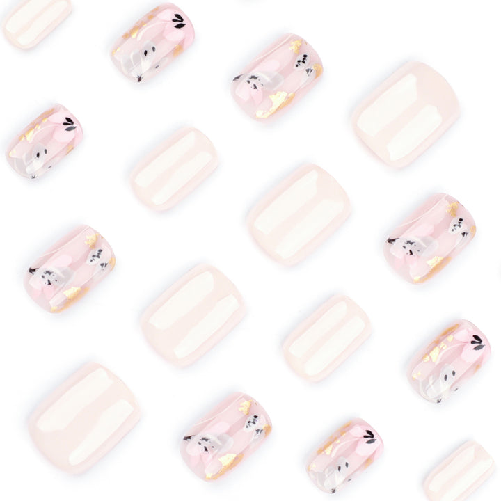 Elegant Artificial Nail Design with Floral Accents Kalsten