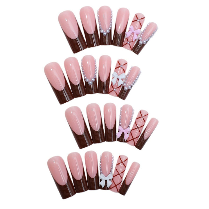 Creative nail art set with stylish bow and glitter accents Kalsten